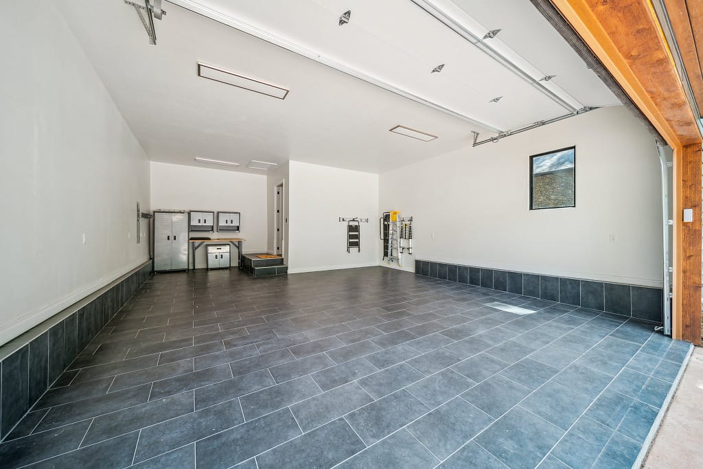 Large garage with tile flooring