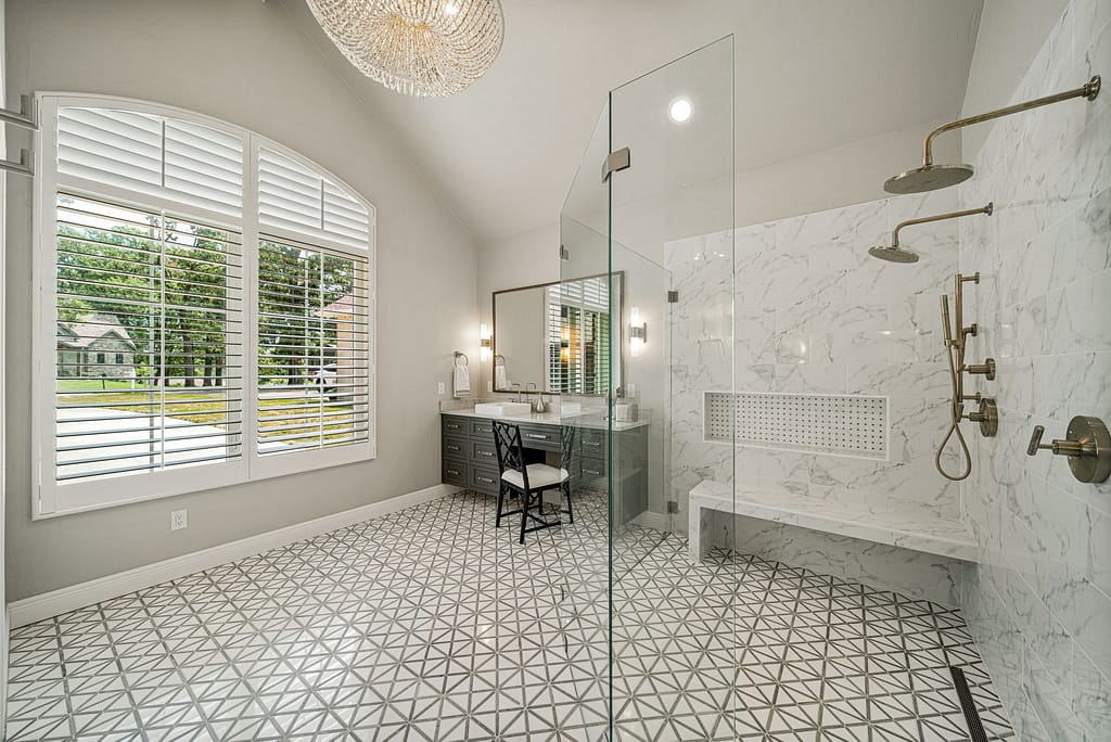 Modern bathroom with vanity and shower after remodel