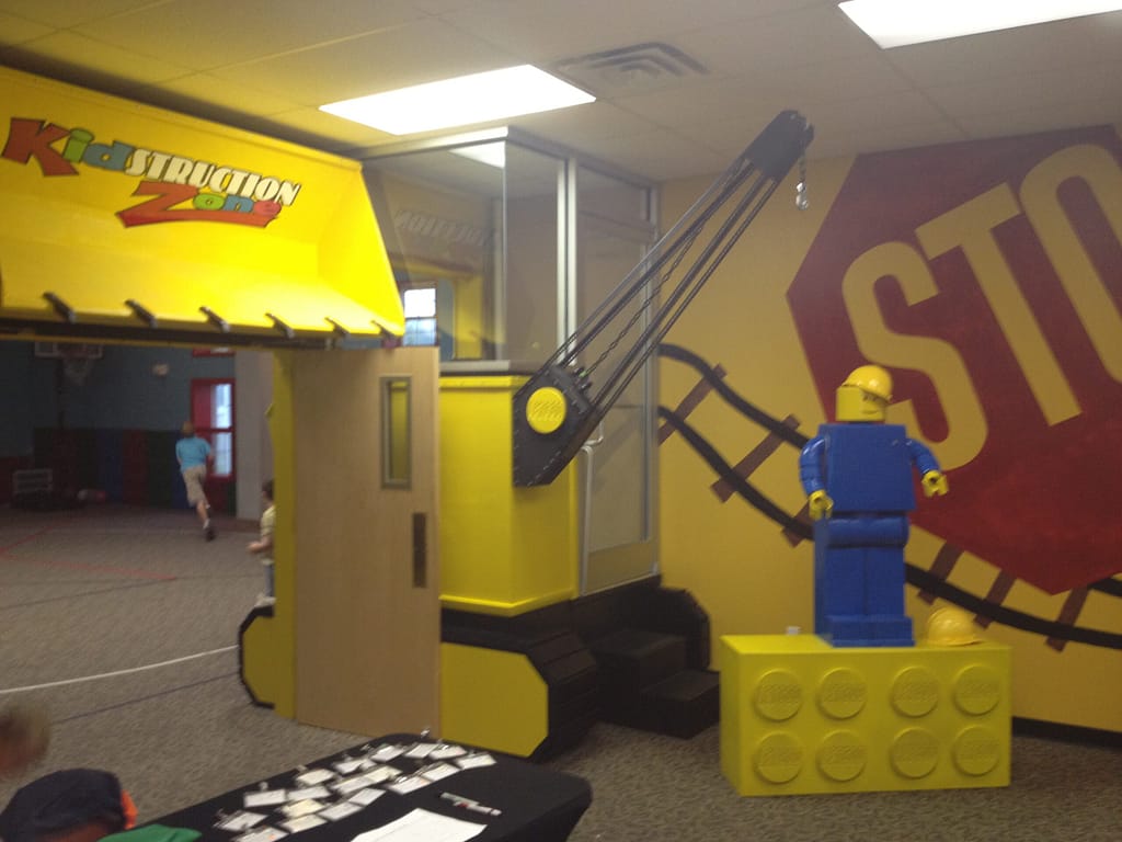 Children's play room with a construction and legos theme
