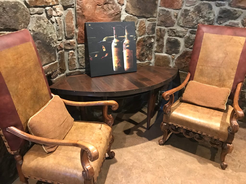 niche with leather seating and rock accent walls