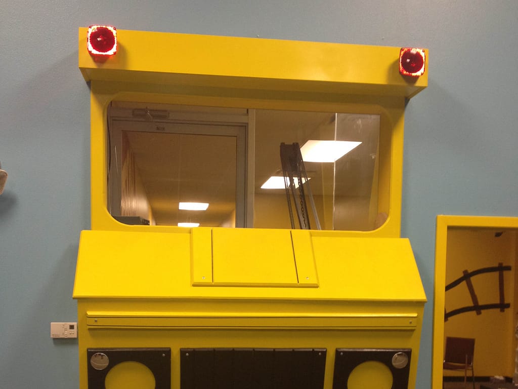 dump truck built into wall for children to play in