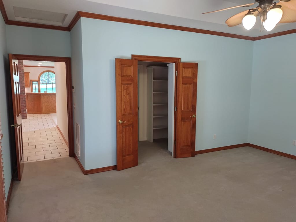 Master bedroom with closet before remodel