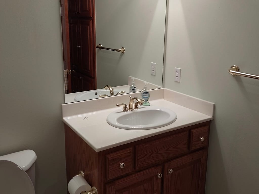 Bathroom with single vanity before remodel