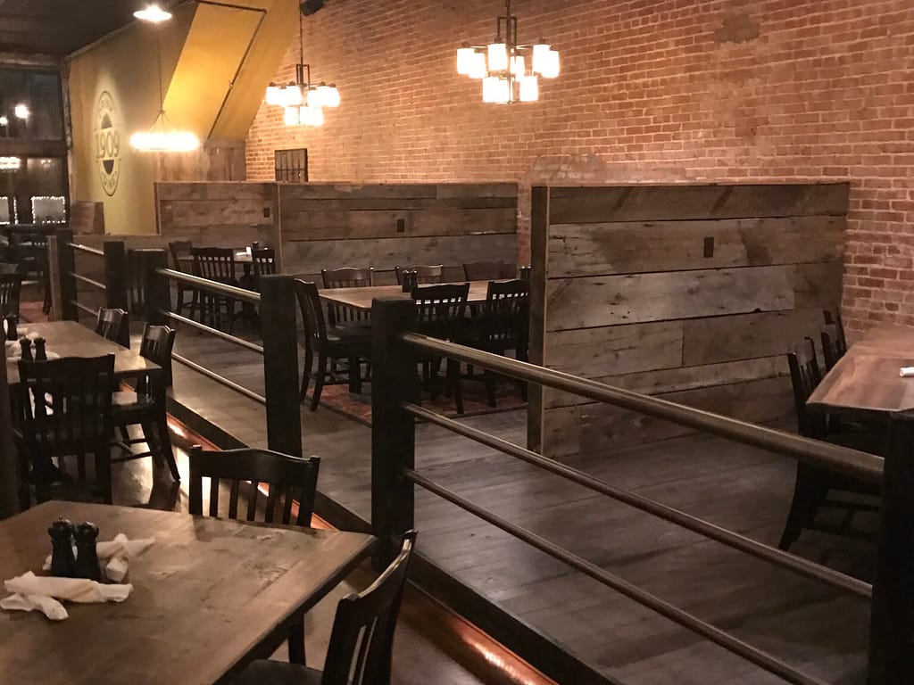 seating at restaurant with brick wall