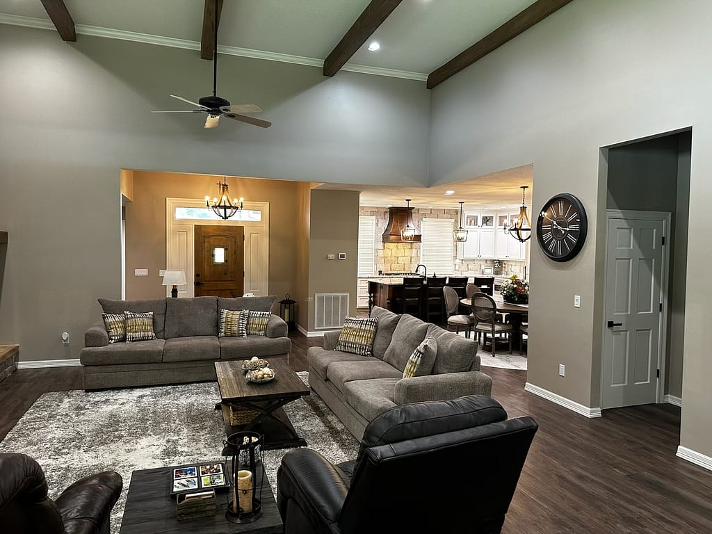 Large living room with beams and entry after remodel