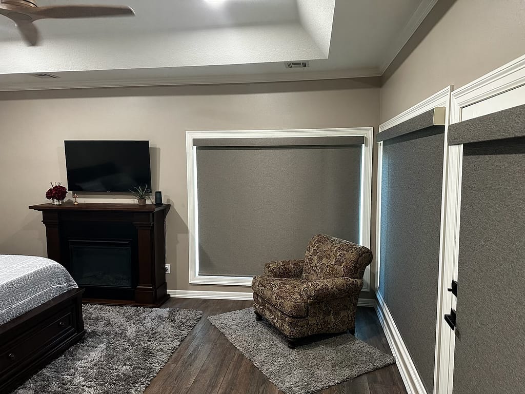 Master bedroom with windows and exterior door after remodel